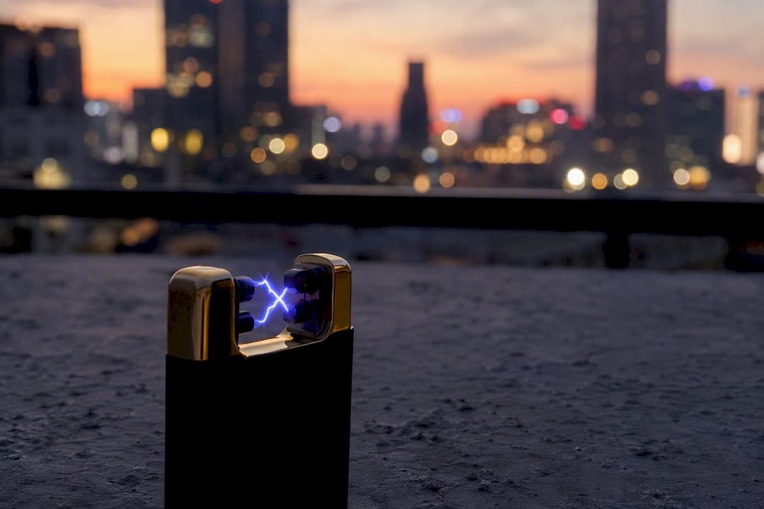 Purple plasma arc between lighter electrodes