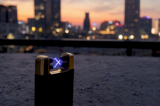 Purple plasma arc between lighter electrodes