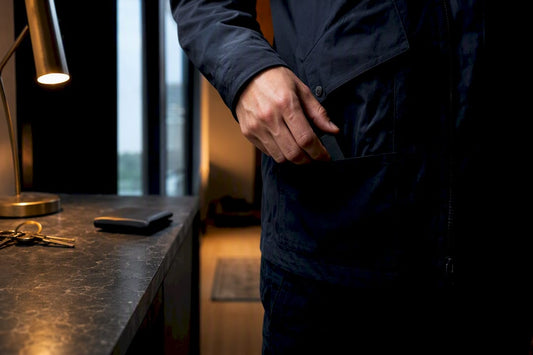 Partial lighter sliding into jacket pocket