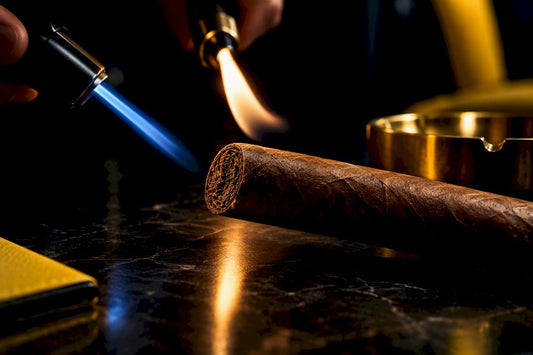Torch and soft flames beside cigar foot
