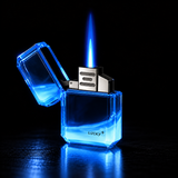 A transparent blue lighter with a silver metal ignition head, shown lit with a bright blue flame against a black background. — view 2