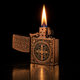 An ornate bronze lighter with intricate embossed patterns and a circular emblem on the front, shown lit with a bright flame against a black background. — view 3