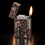An ornate bronze-toned lighter with a skull and gothic floral embossed design — view 3