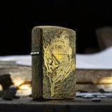 A brass lighter with a skull engraving and the phrase 'I'm Fine' on the front. — view 2