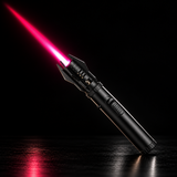 A black lighter with red flame diagonally across a dark studio background — view 1